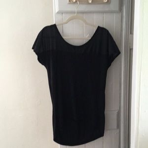 Black blouse with sheer top and low high bottom